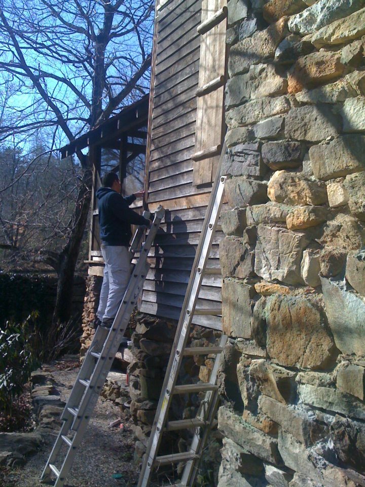 Allman Brother's Painting in Action on a Residential Home's Siding
